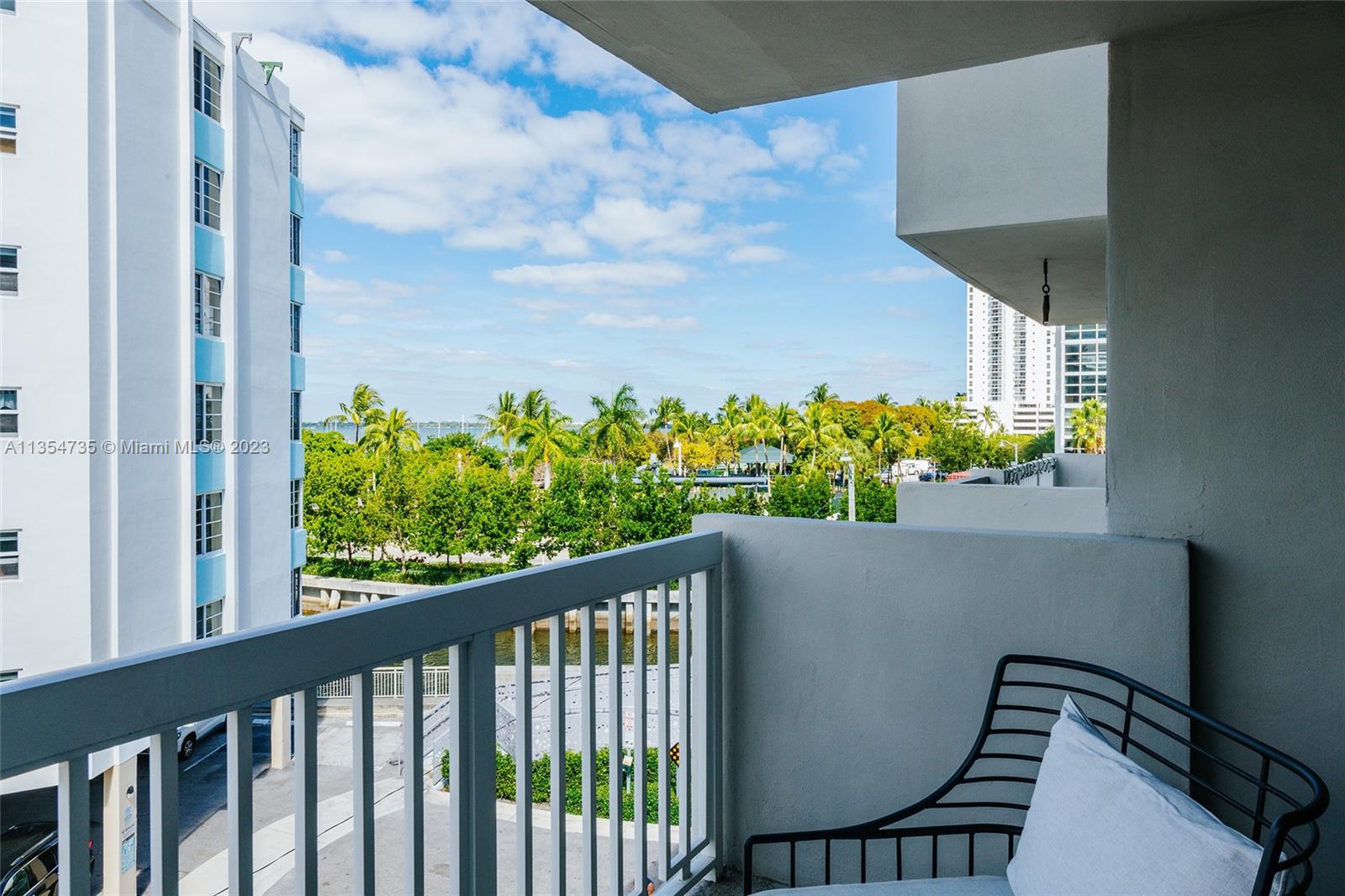 1670 Bay Road, Unit 4F Miami Beach, FL 33139 - Photo 1 of 12 a balcony with street view