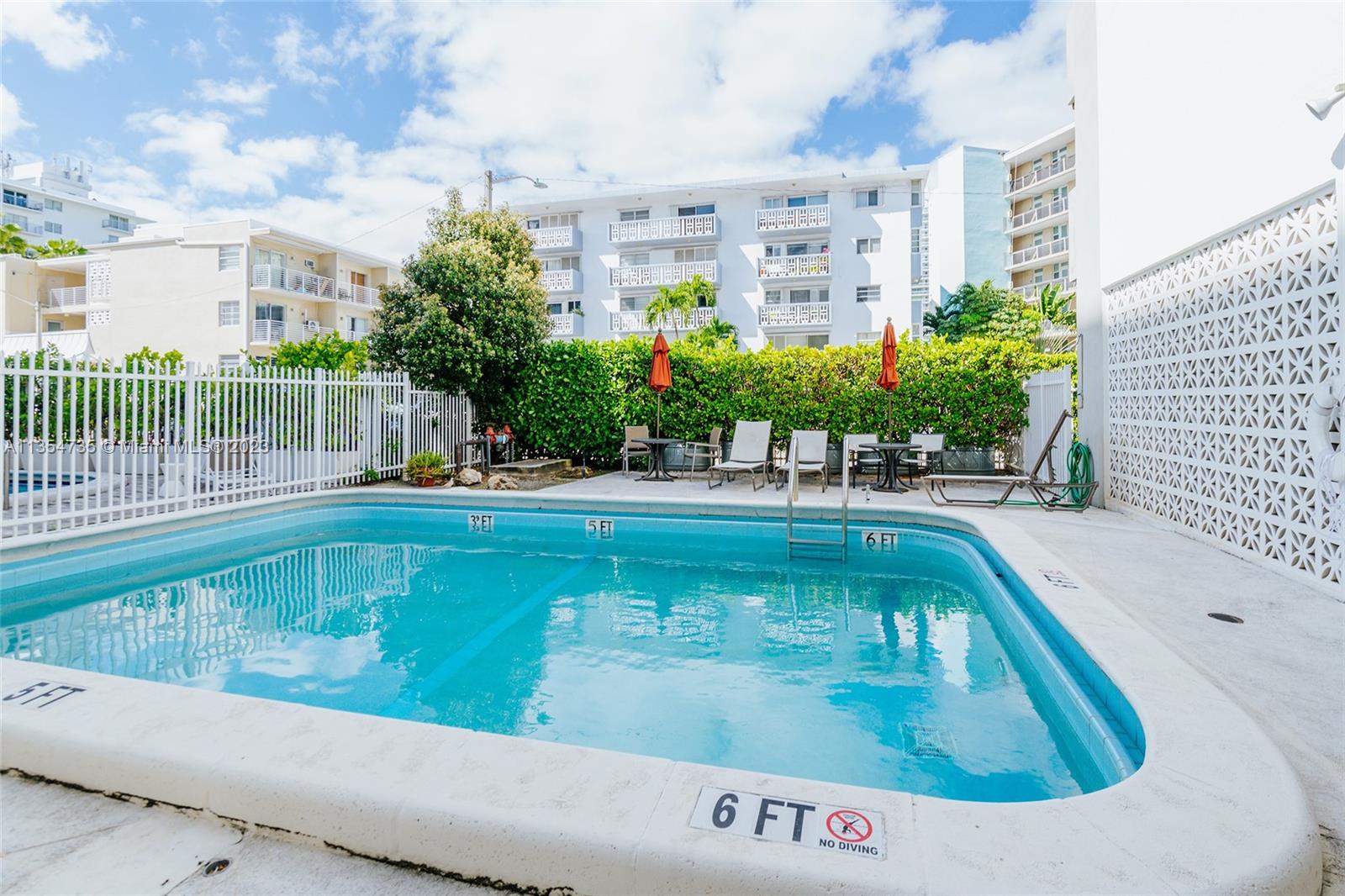 1670 Bay Road, Unit 4F Miami Beach, FL 33139 - Photo 11 of 12 a view of swimming pool from a balcony