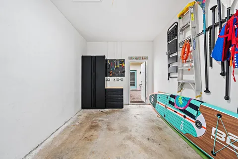 an aerial view of multiple houses with yard