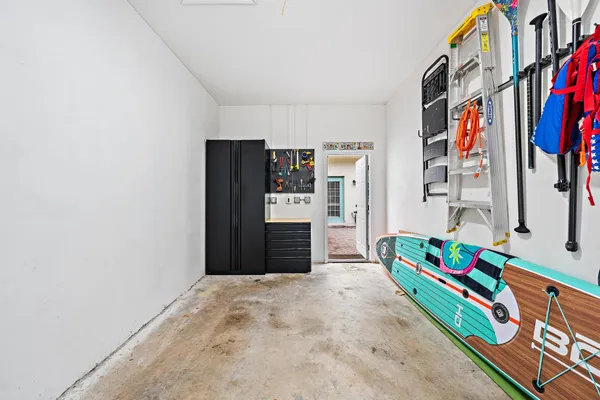 an aerial view of multiple houses with yard