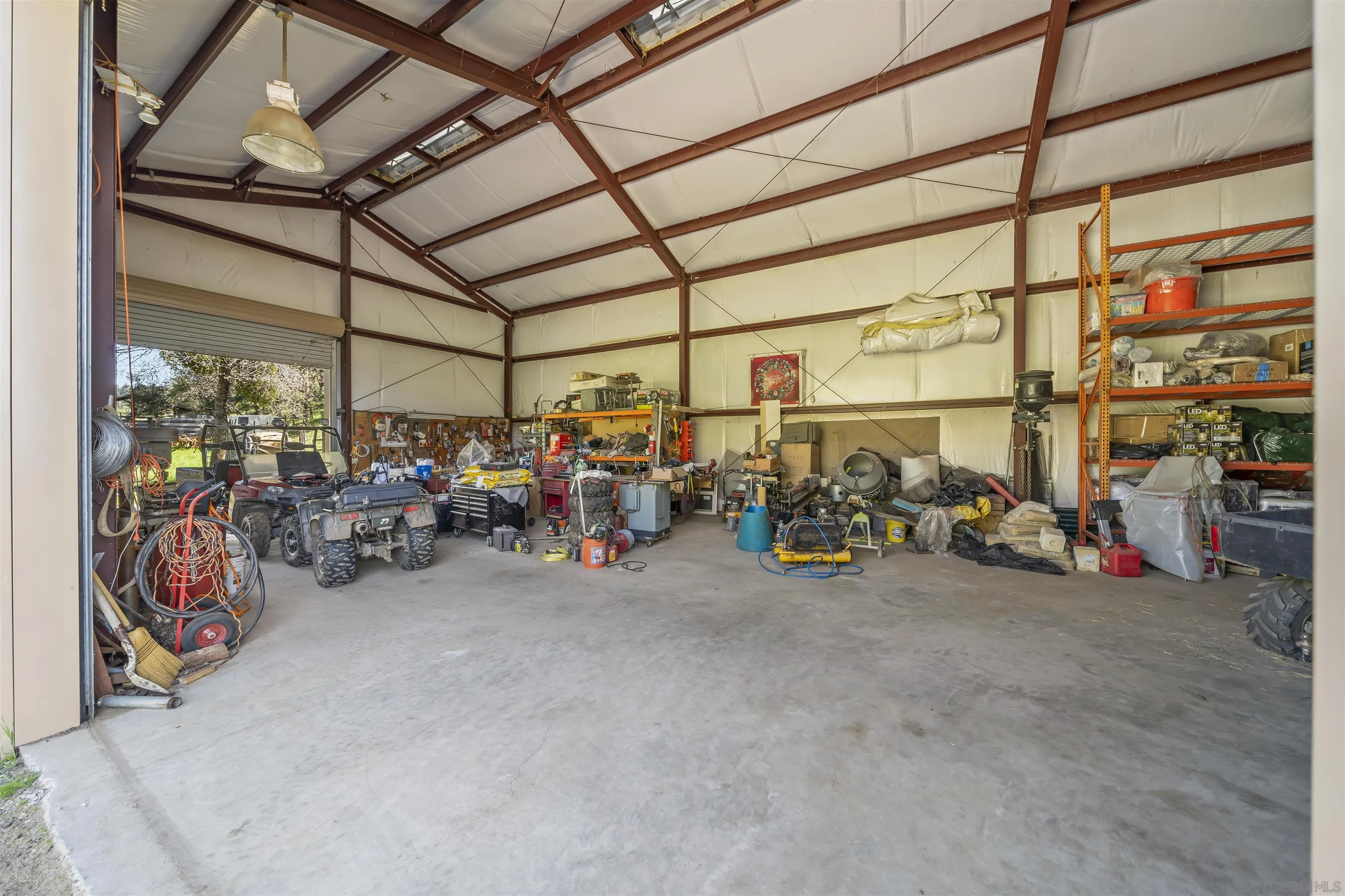 2464 Wynola Road Julian, CA 92036 - Photo 39 of 50 a view of a storage room with a lot of stuff