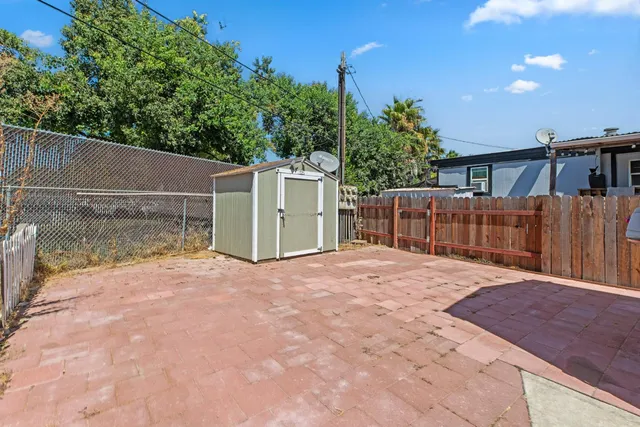 a view of a backyard of a house