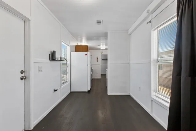 a view of a storage & utility room with a window