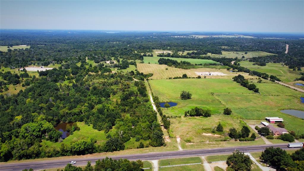 84 Highway 84 Fairfield, TX 75840 - Photo 17 of 18 an aerial view of residential houses with outdoor space