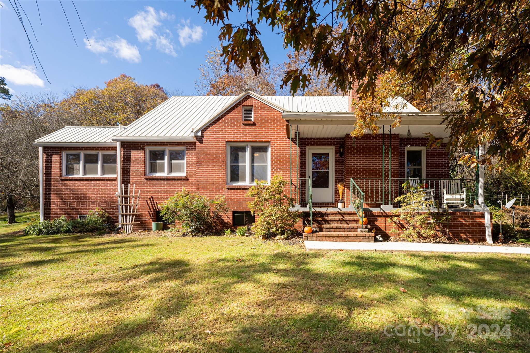 5074 Thickety Road Canton, NC 28716 - Photo 1 of 48 a view of a house with a patio