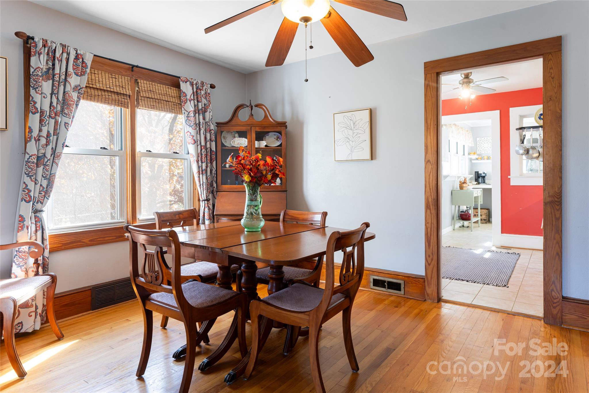 5074 Thickety Road Canton, NC 28716 - Photo 11 of 48 a view of a dining room with furniture and wooden floor