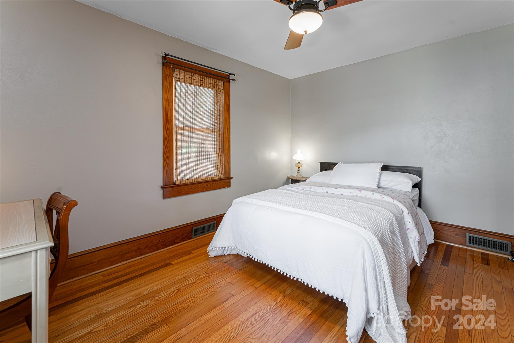 5074 Thickety Road Canton, NC 28716 - Photo 29 of 48 a bedroom with a bed and a window