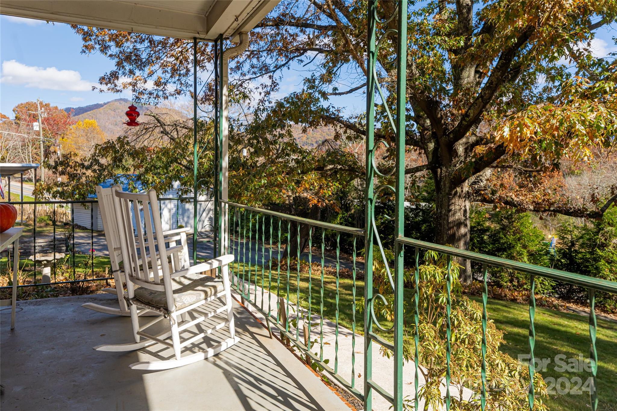 5074 Thickety Road Canton, NC 28716 - Photo 4 of 48 a view of balcony with wooden floor and outdoor seating