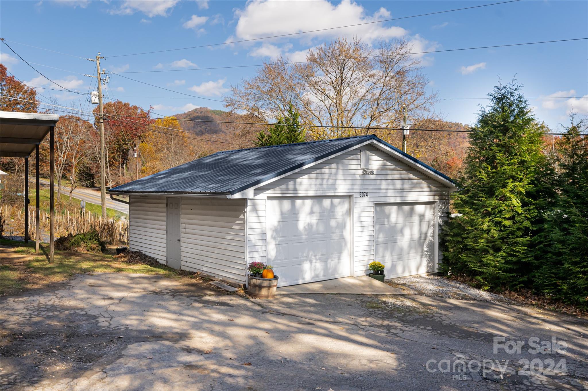5074 Thickety Road Canton, NC 28716 - Photo 42 of 48 a view of a house with backyard