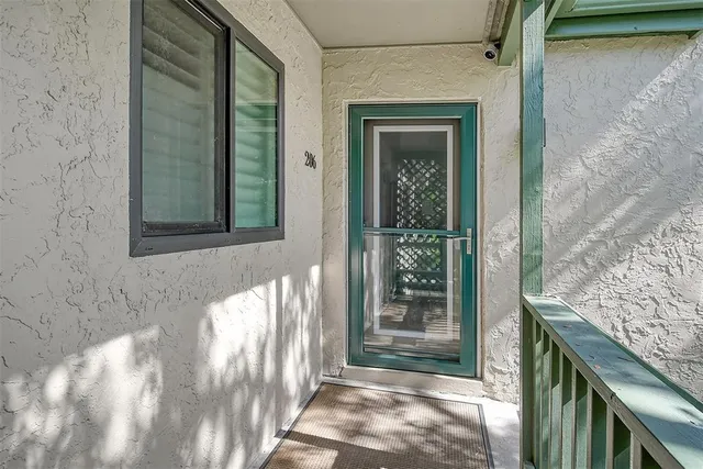 a view of a door and outdoor space