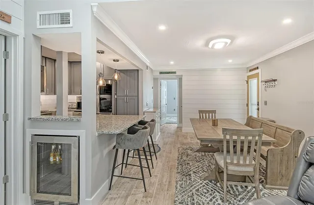 a view of a livingroom with furniture and window