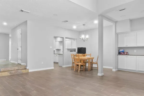 a view of a workspace with furniture and a livingroom