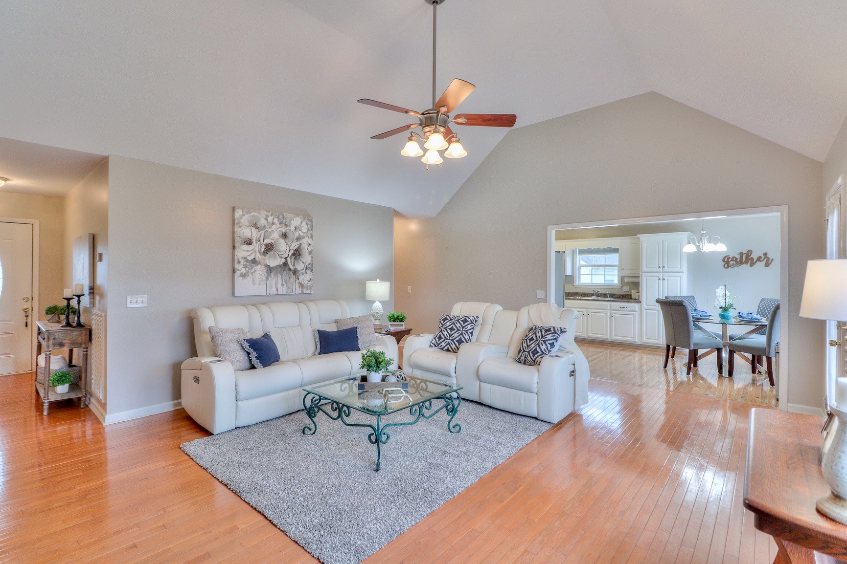 3580 Gnat Hill Road Manchester, TN 37355 - Photo 11 of 37 a living room with furniture a dining table and a chandelier