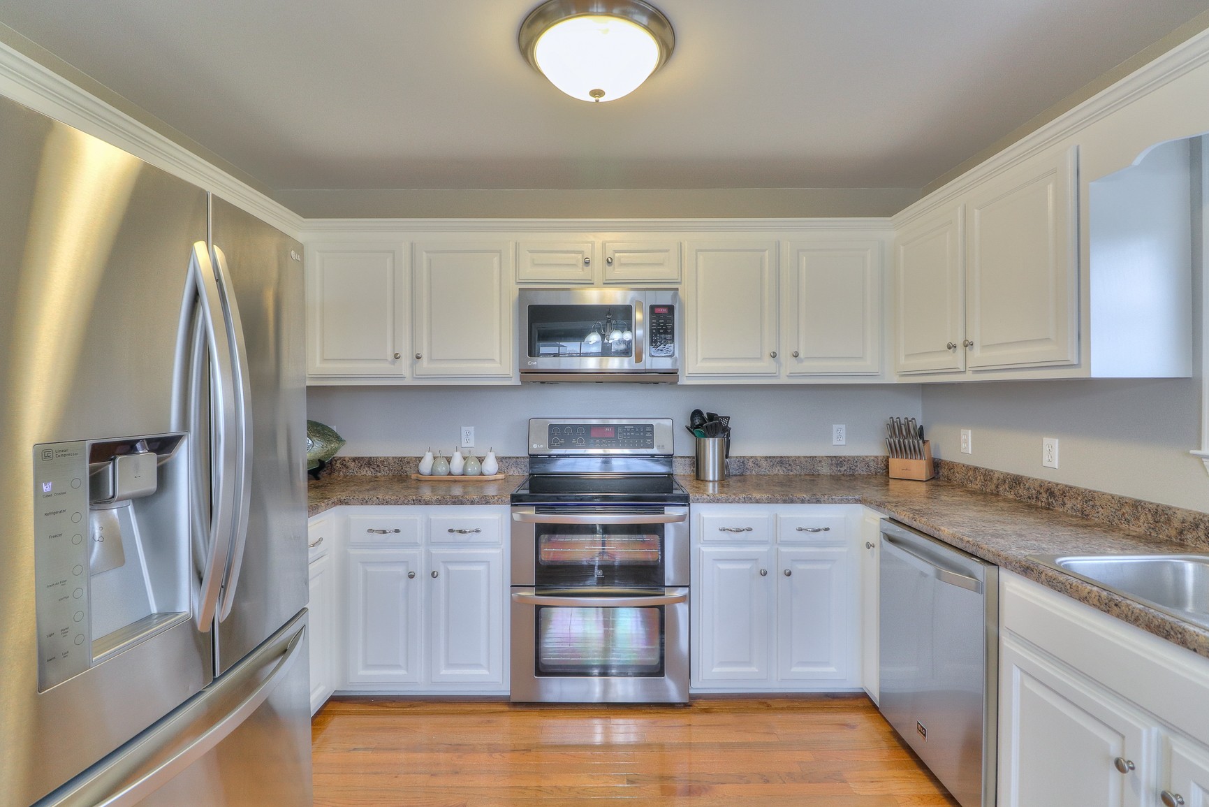 3580 Gnat Hill Road Manchester, TN 37355 - Photo 15 of 37 a kitchen with stainless steel appliances granite countertop a refrigerator sink and stove
