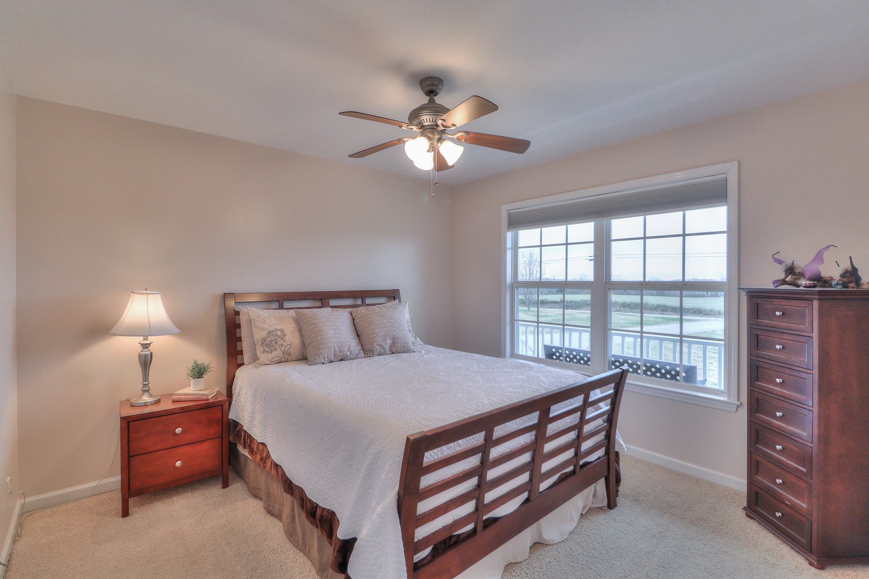 3580 Gnat Hill Road Manchester, TN 37355 - Photo 21 of 37 a bedroom with a bed and a chandelier