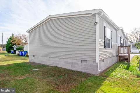 a view of a backyard with a garden
