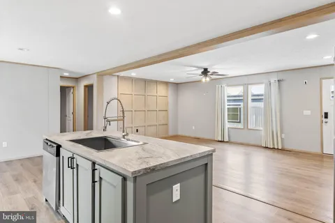a kitchen with a stove and a sink