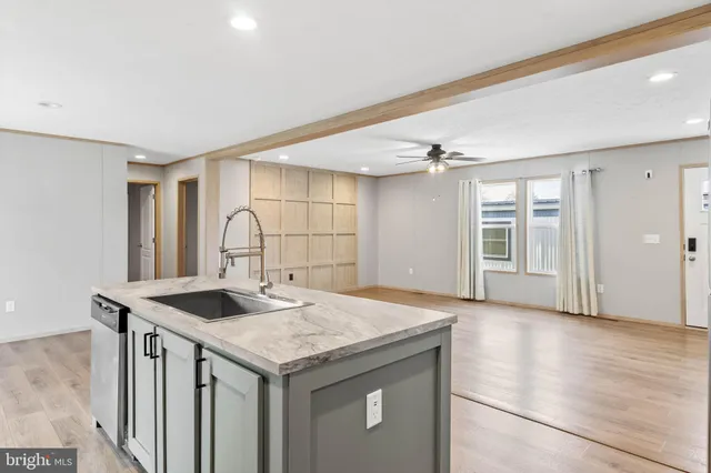 a kitchen with a stove and a sink