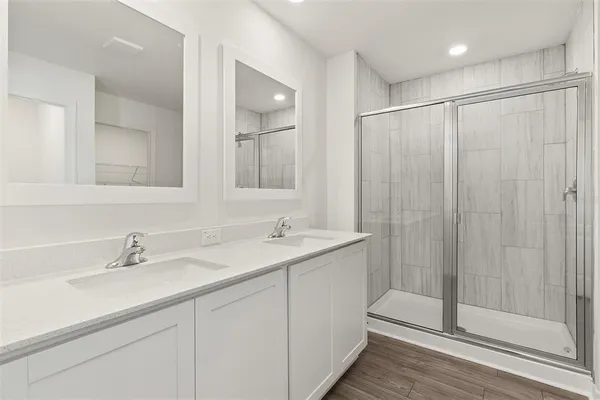 a bathroom with a sink and mirror