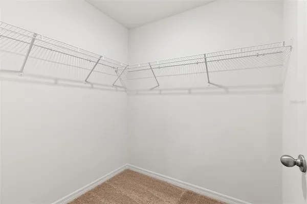 a view of a room with racks on the wall