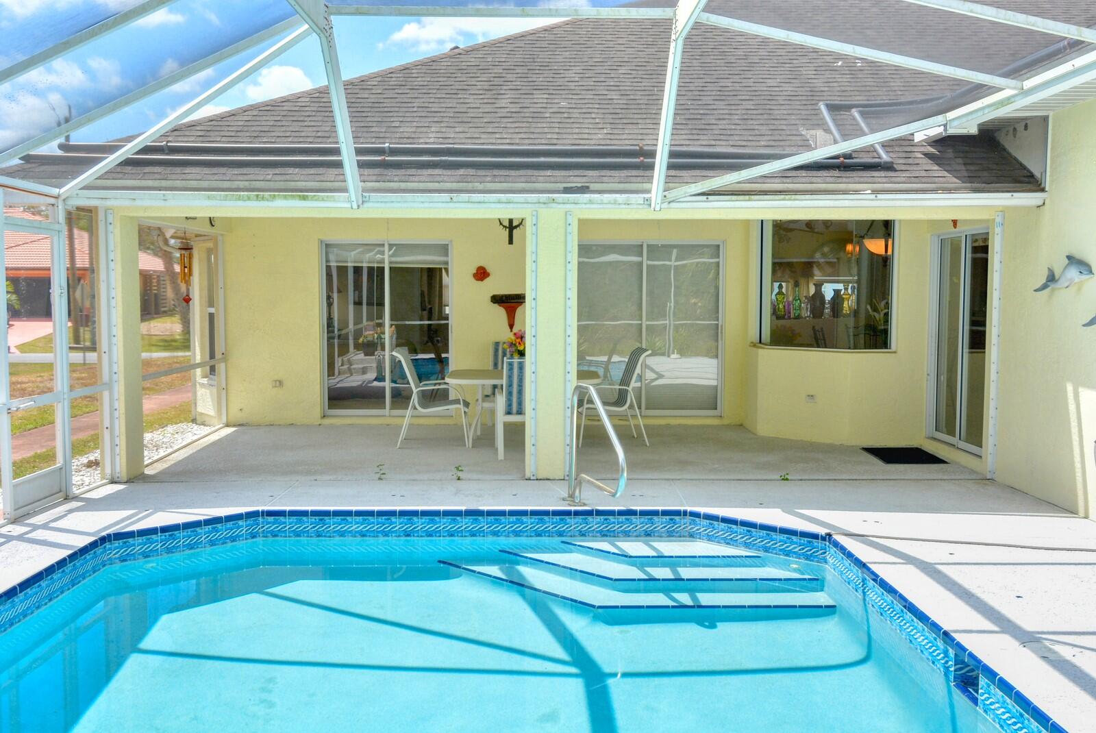 2041 Southwest Villanova Road Port St. Lucie, FL 34953 - Photo 35 of 42 a view of a porch with seating space