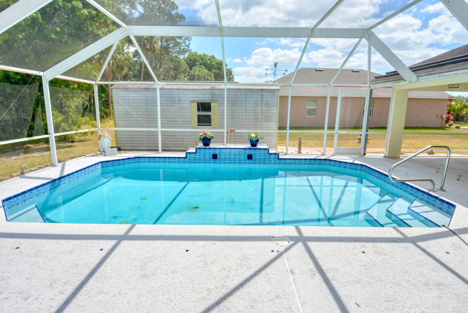 2041 Southwest Villanova Road Port St. Lucie, FL 34953 - Photo 38 of 42 a house view with a outdoor space