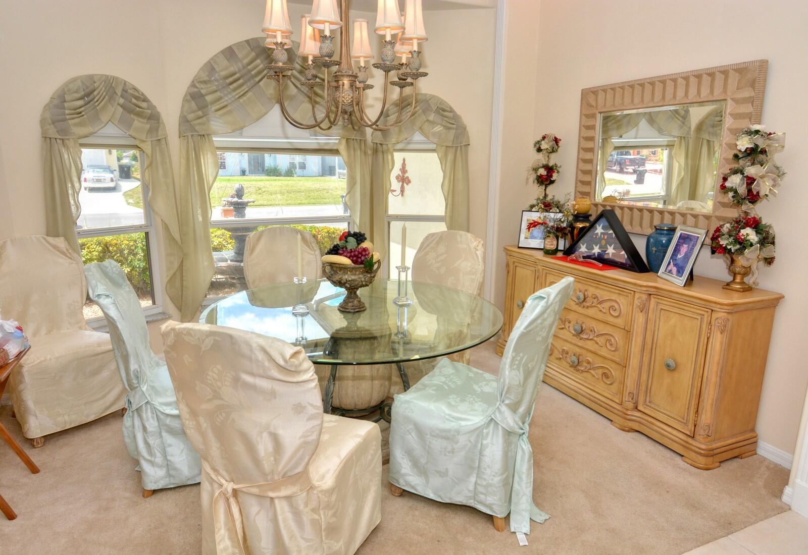 2041 Southwest Villanova Road Port St. Lucie, FL 34953 - Photo 6 of 42 a view of a dining room with furniture