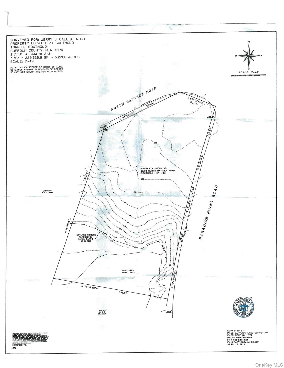 11200 North Bayview Road Southold, NY 11971 - Photo 7 of 7 a picture of a room with a white wall and a window
