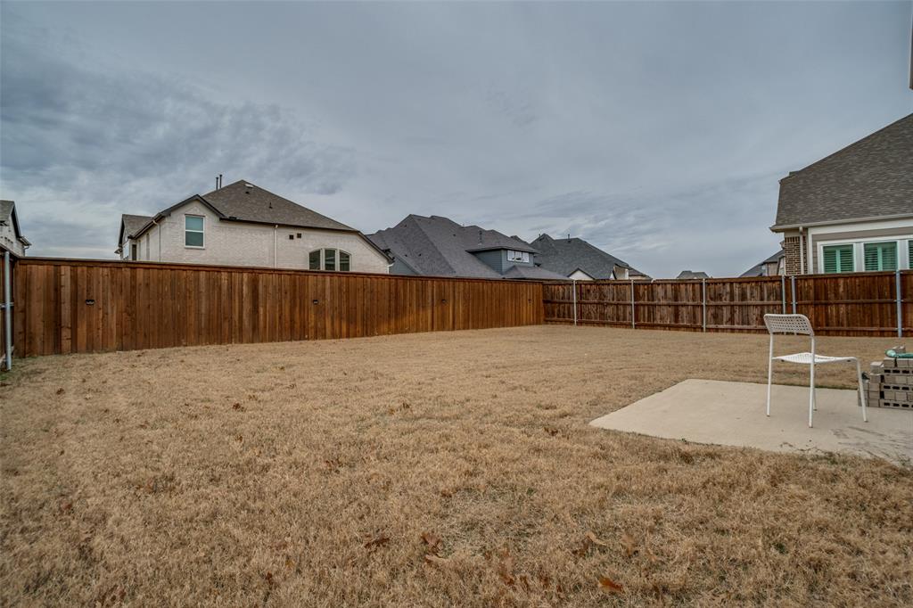 2811 Killdeer Trail Prosper, TX 75078 - Photo 29 of 36 Fenced backyard with a patio area