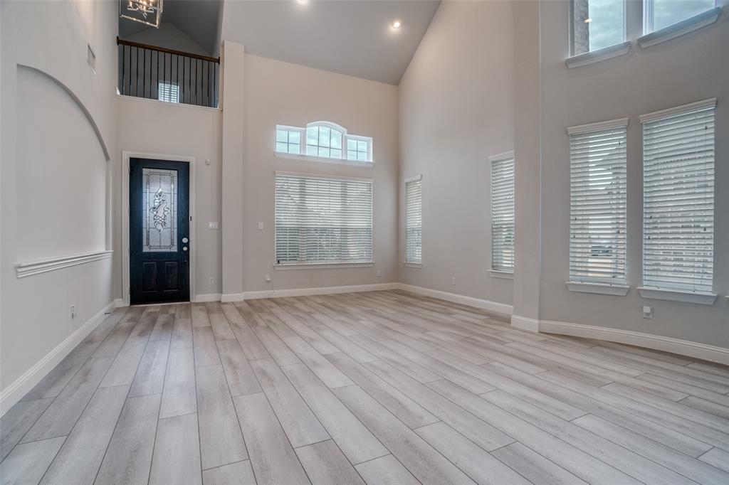 2811 Killdeer Trail Prosper, TX 75078 - Photo 3 of 36 Entrance foyer featuring light wood-style floors, lofted ceiling, and recessed lighting