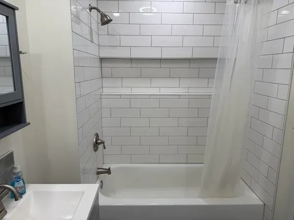 a bathroom with a bathtub