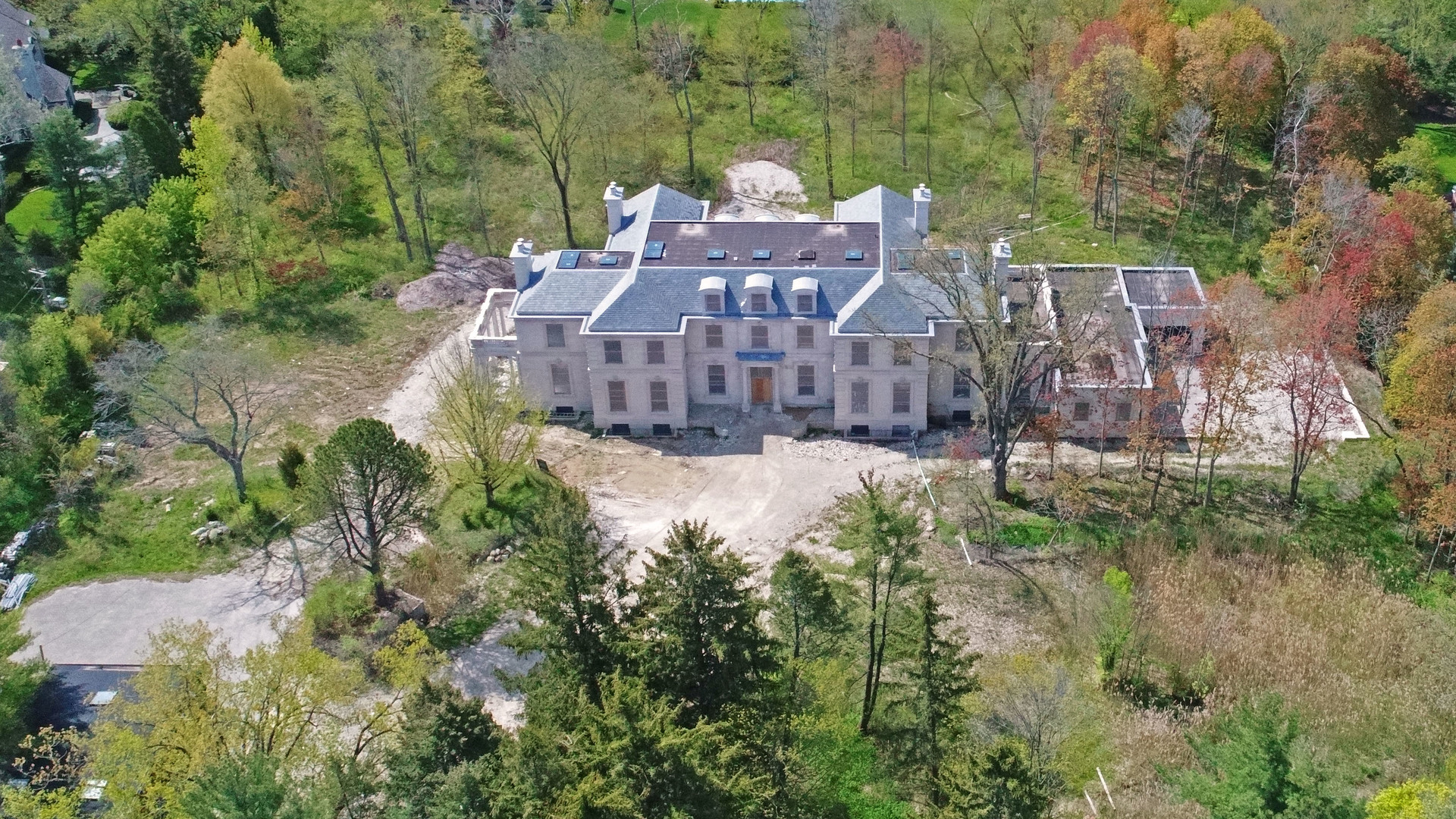 333 Foster Place Lake Forest, IL 60045 - Photo 2 of 21 a view of a house with a yard and large trees