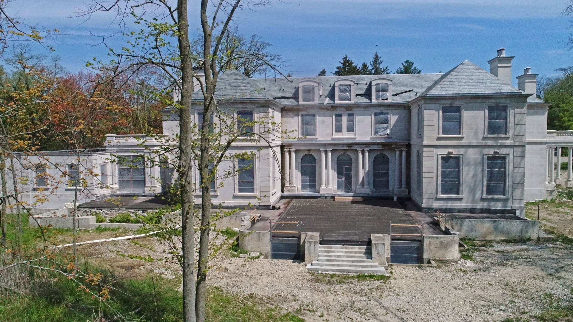 333 Foster Place Lake Forest, IL 60045 - Photo 14 of 21 a front view of a residential apartment building with a yard