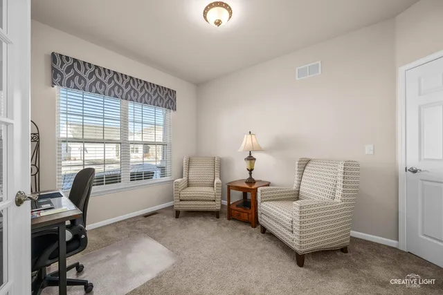 a view of a hallway with washer and dryer