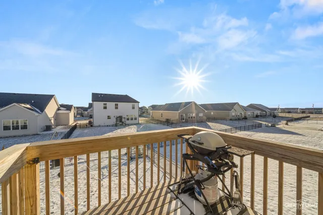 an aerial view of a house with a swimming pool