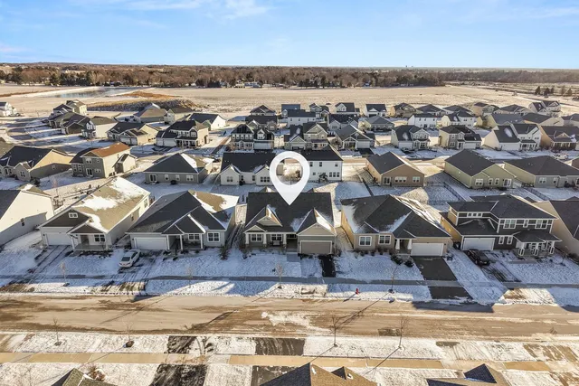 an aerial view of a house with a outdoor space