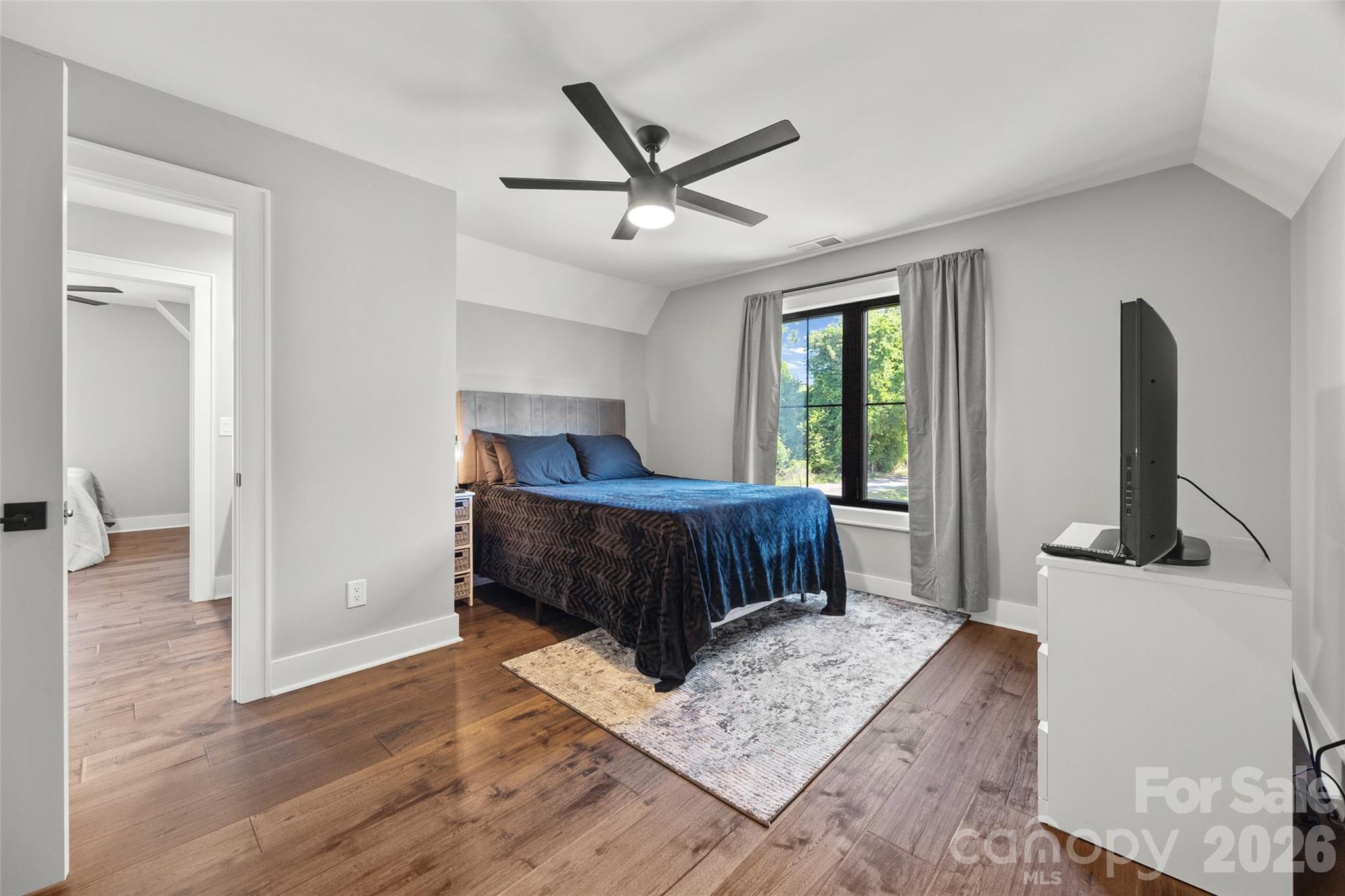 5438 Ralph Harper Lane Clover, SC 29710 - Photo 23 of 28 a living room with a bed furniture and a large window