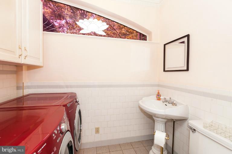 611 Edgevale Road Baltimore, MD 21210 - Photo 9 of 30 1st floor powder room / laundry