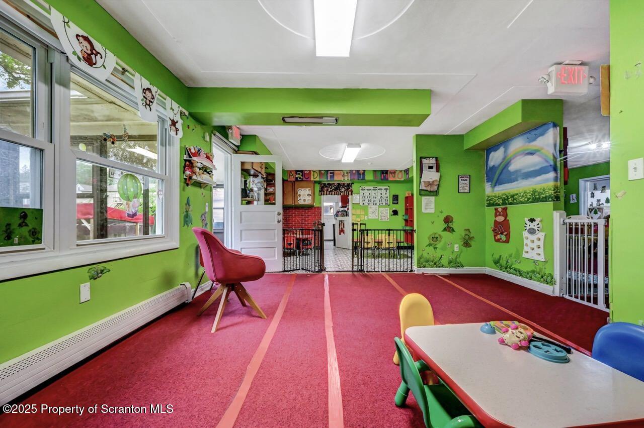 2118 Washburn Street Scranton, PA 18504 - Photo 11 of 72 a view of a chairs and table in the patio