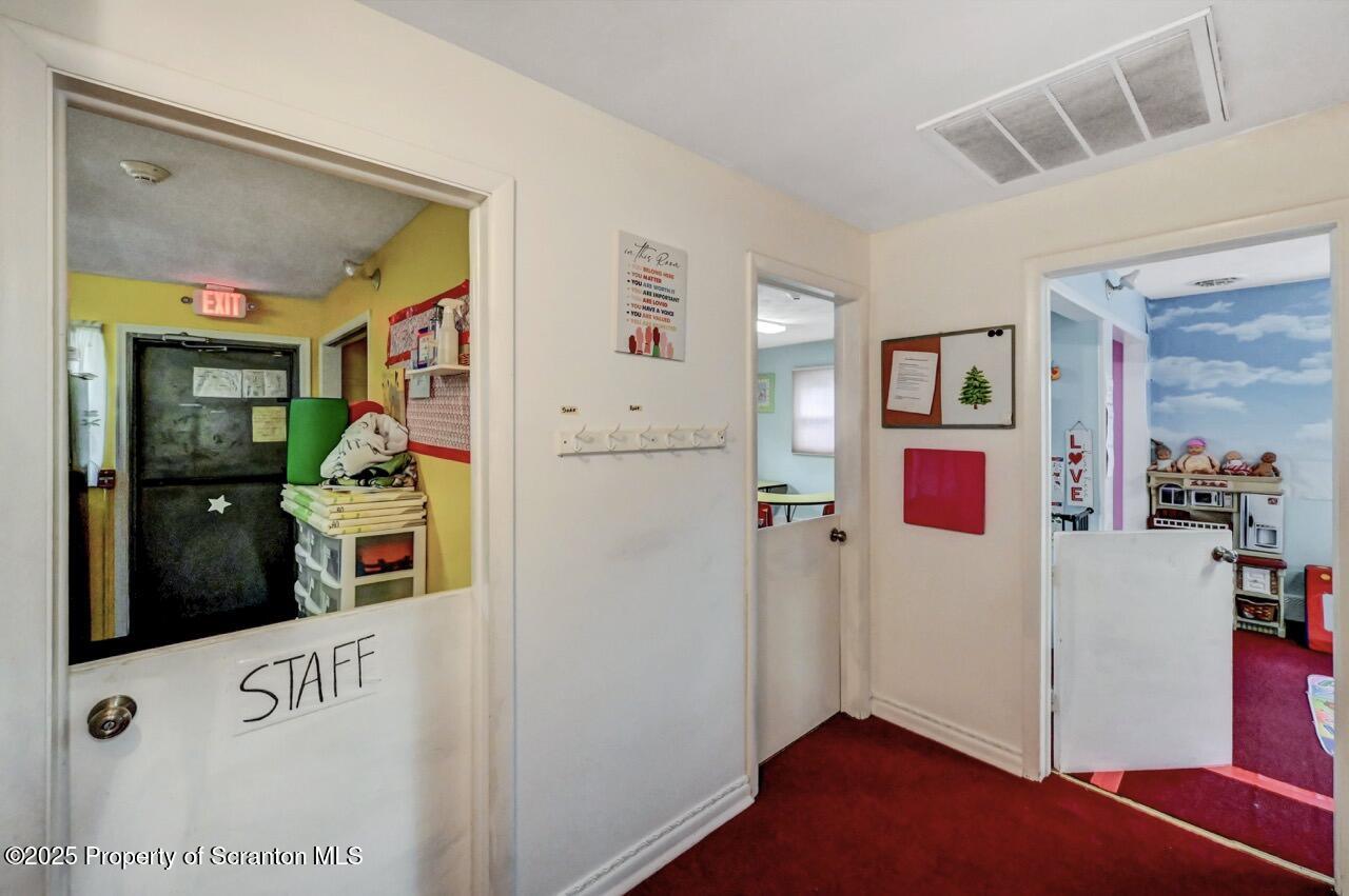 2118 Washburn Street Scranton, PA 18504 - Photo 20 of 72 a view of hallway with furniture and a window