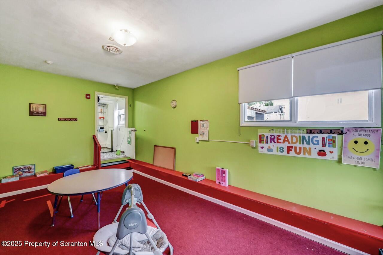 2118 Washburn Street Scranton, PA 18504 - Photo 39 of 72 a room with furniture and window