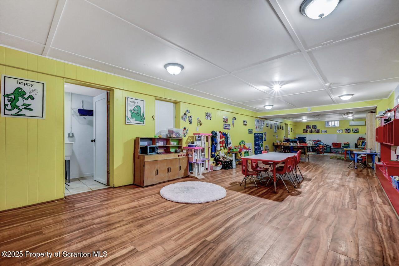 2118 Washburn Street Scranton, PA 18504 - Photo 42 of 72 a view of a dining room with furniture and wooden floor
