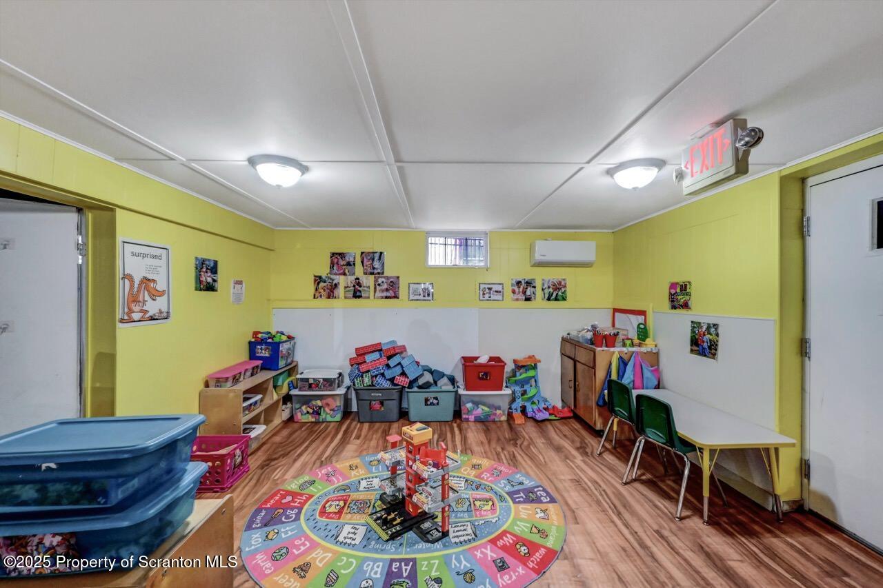 2118 Washburn Street Scranton, PA 18504 - Photo 49 of 72 a garage filled with lots of clutter and furniture
