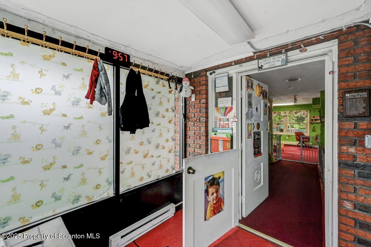 2118 Washburn Street Scranton, PA 18504 - Photo 55 of 72 a view of walk in closet with clothes and shoes
