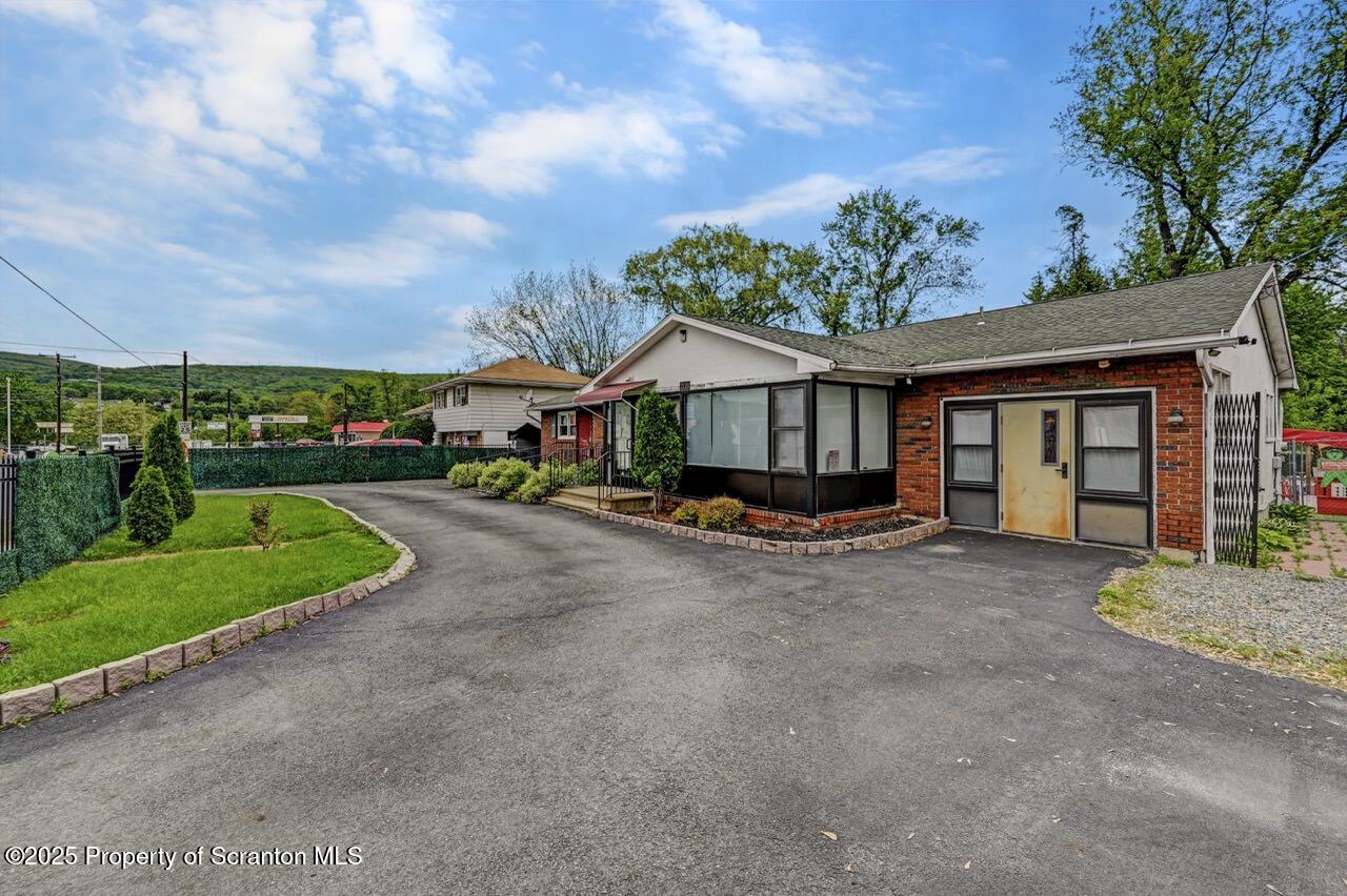 2118 Washburn Street Scranton, PA 18504 - Photo 59 of 72 a view of a house with a yard and garage