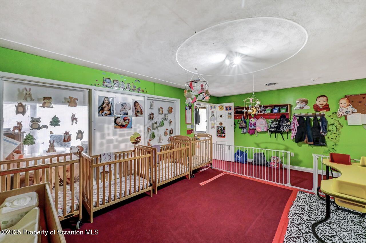 2118 Washburn Street Scranton, PA 18504 - Photo 6 of 72 a view of a livingroom with furniture and toys