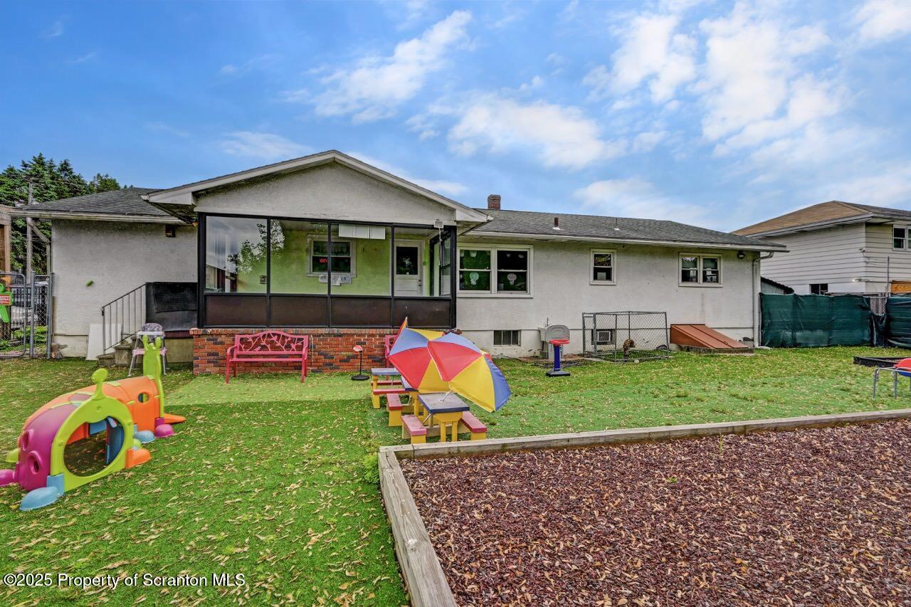 2118 Washburn Street Scranton, PA 18504 - Photo 63 of 72 a front view of house with yard and outdoor seating