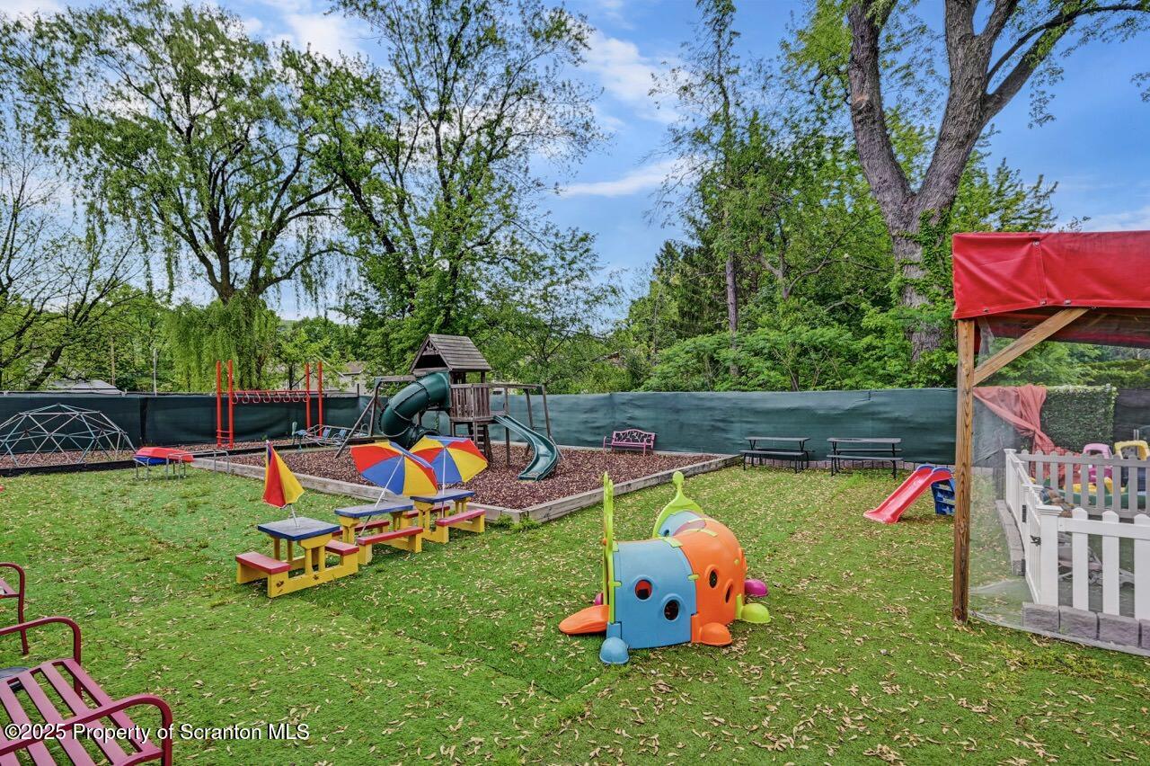 2118 Washburn Street Scranton, PA 18504 - Photo 64 of 72 a backyard of a house with table and chairs