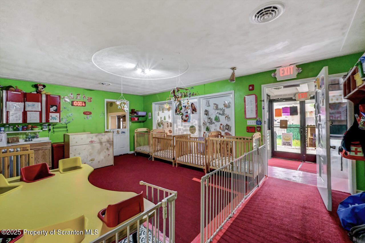 2118 Washburn Street Scranton, PA 18504 - Photo 7 of 72 a living room with furniture and a flat screen tv