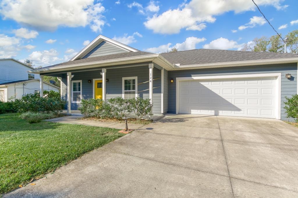 124 Dory Road St. Augustine, FL 32086 - Photo 2 of 39 a view of a house with garden